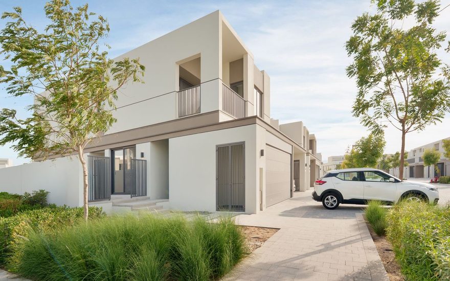 Large family villa with a lawn and covered terrace